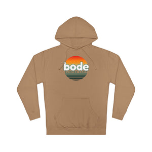 The 2026 Bode Summer Bootcamp — Cali Sunset Hoodie Sweatshirt - SS4500 by Printify is a soft cotton-poly fleece tan hoodie with a front pocket and retro "bode SUMMER CAMP" graphic with an orange sunset on the chest.