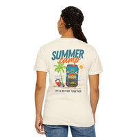 A person faces away, wearing a Printify BODE Summer Camp T-Shirt 2026—Unisex Comfort Colors 1717—in white, featuring a beach scene and "LIFE IS BETTER TOGETHER" text. Double-needle stitching adds durability.