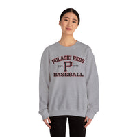 A person wears a Printify P Reds Baseball Est. 1978 Unisex Heavy Blend™ Crewneck Sweatshirt in light gray, standing against a plain white background.