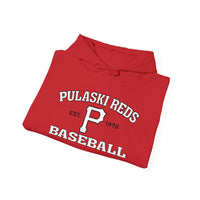The Printify Pulaski Reds Baseball Est. 1978 Unisex Heavy Blend™ Hooded Sweatshirt features "Pulaski Reds Baseball Est. 1978" and a bold white "P" on the front—a classic vintage-style pullover perfect for any fan.
