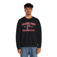 A person models the Printify P Reds Baseball Est. 1978 - Unisex Heavy Blend™ Crewneck Sweatshirt, featuring "Pulaski Reds Baseball Est. 1978" in red and white text, against a plain white background.