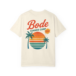 The BODE Summer Camp T-Shirt 2026 "Throwback Sunset" by Printify features palm trees, a sunset, and stylized waves on the back of a cream Comfort Colors tee—your go-to summer camp shirt in soft, garment-dyed cotton.
