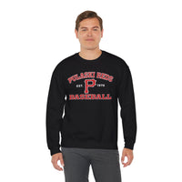 A man faces the camera wearing a Printify P Reds Baseball Est. 1978 Unisex Heavy Blend™ Crewneck Sweatshirt, featuring the vintage graphic on the front.