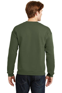 A person is shown from the back wearing a green Gildan Heavy Blend Crewneck Sweatshirt 18000 and dark jeans.
