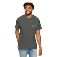 A man smiles against a white background wearing a dark gray BODE Summer Camp T-Shirt 2026 by Printify, featuring “Life’s Better Together” and a bear paw graphic on a Comfort Colors 1717 unisex tee.