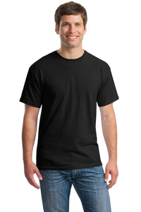 A man faces forward in a Gildan Heavy 100% Cotton Custom T-Shirt (Gildan 5000), plain black with short sleeves, paired with blue jeans, set against a white background.