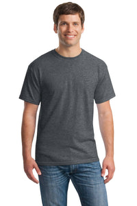 A man smiles facing forward in a Gildan 5000 Heavy 100% Cotton Custom T-Shirt and blue jeans, standing against a white background.