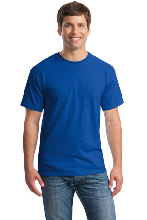A man smiles against a white background, wearing a Gildan Heavy 100% Cotton Custom T-Shirt (Gildan 5000) in royal blue and blue jeans.