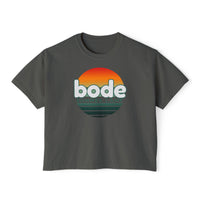 Printify's 2026 Bode Summer Bootcamp - Cali Sunset Logo Crop T-Shirt (3023CL) is a dark gray, boxy, ring-spun cotton top with a front graphic of an orange sunset and "bode" above "SUMMER CAMP.