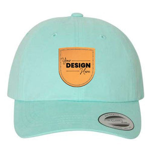 A mint green YP Classics hat with a cotton twill and orange patch.