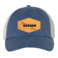 A low-profile blue and white Sportsman Pigment-Dyed Snapback Trucker Hat with your design on it made of cotton/polyester blend.