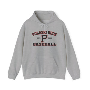 The Pulaski Reds Baseball Est. 1978 - Unisex Heavy Blend™ Hooded Sweatshirt by Printify features "Pulaski Reds Baseball EST. 1978" and a large maroon "P" on the front—a classic vintage style for fans and players alike.