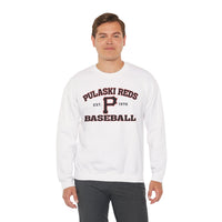 A man wears the Printify P Reds Baseball Est. 1978 Unisex Heavy Blend™ Crewneck Sweatshirt, featuring vintage lettering, while standing against a plain white background.