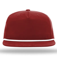 A Richardson 256 Umpqua Rope Snapback Cap, featuring a flat brim in red with a white accent line around the base.