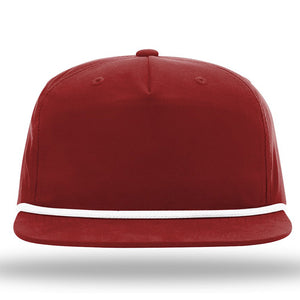 A Richardson 256 Umpqua Rope Snapback Cap, featuring a flat brim in red with a white accent line around the base.