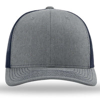 A grey and navy Richardson 112 Snapback Trucker Cap with a pre-curved visor and mesh back on a white background.