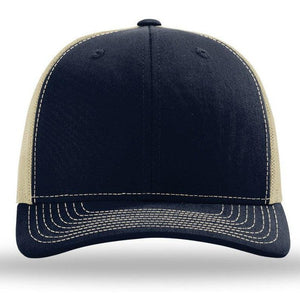 A navy and tan Richardson 112 Snapback Trucker Cap with a pre-curved visor and mesh back on a white background.