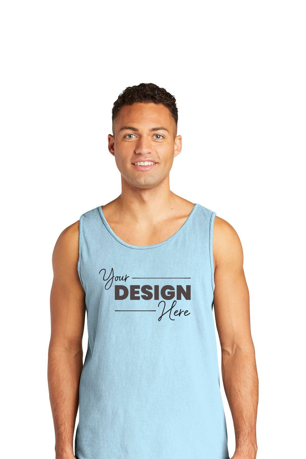 A man wearing a Comfort Colors Heavyweight Ring Spun Tank Top 9360 with the words "Your Design Here" printed on the front stands against a plain white background, exuding a vintage look in his comfortable attire from Comfort Colors.
