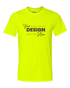 A Gildan Performance Safety T-Shirt in bright yellow, featuring moisture-wicking fabric and the text "Your Design Here" printed in black letters on the front.