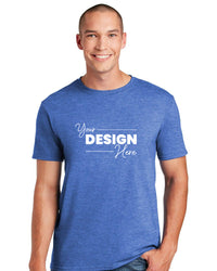 A man in a Gildan Softstyle T-Shirt 64000 by Gildan, featuring a stylish blue design crafted from soft, ring-spun cotton with "Your Design Here," stands against a white background. The modern classic fit and tearaway label enhance its versatile appeal.