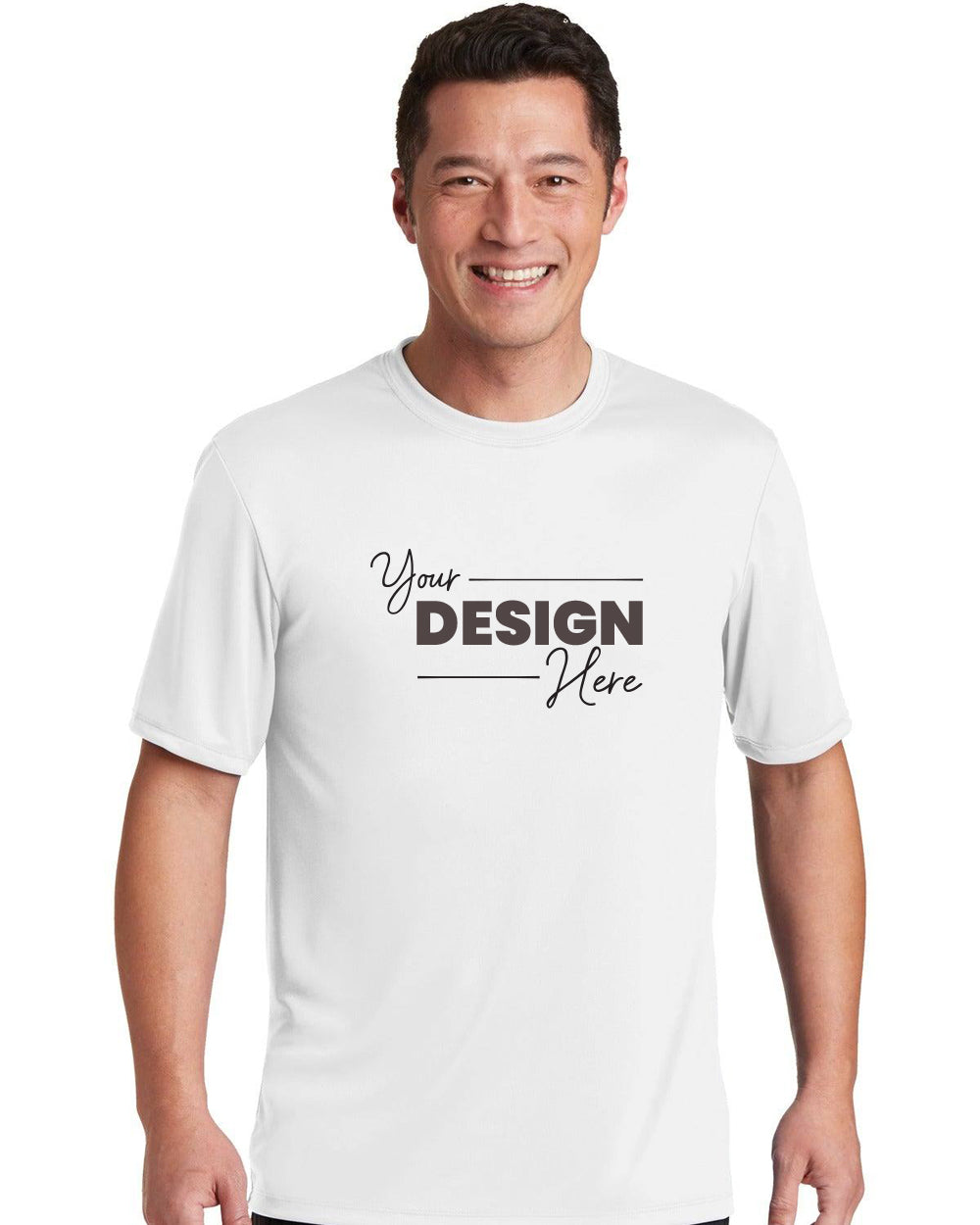 A person wearing a Hanes Cool Dri Performance T-Shirt 4820 in white, featuring the text "Your Design Here," stands smiling against a plain background, highlighting the potential of customized t-shirts.