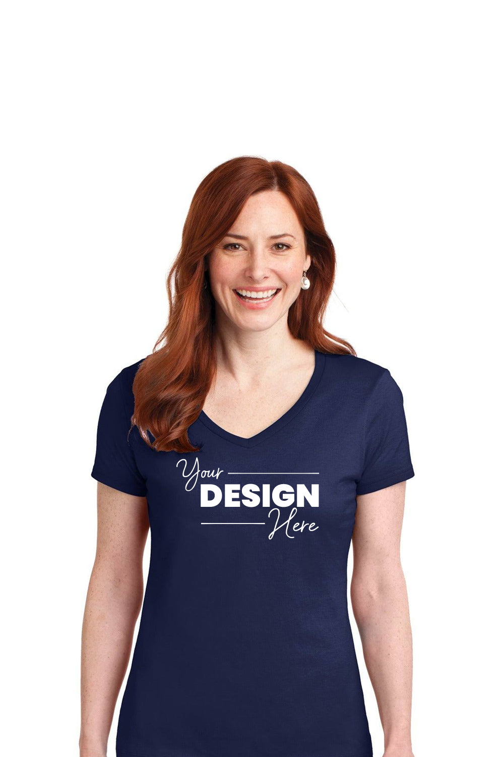 A red-haired woman wears a navy Hanes Ladies Perfect-T Cotton V-Neck T-Shirt S04V with "Your Design Here" on the front. Made from soft ring-spun cotton, this customizable tee highlights her smile against a plain white background.
