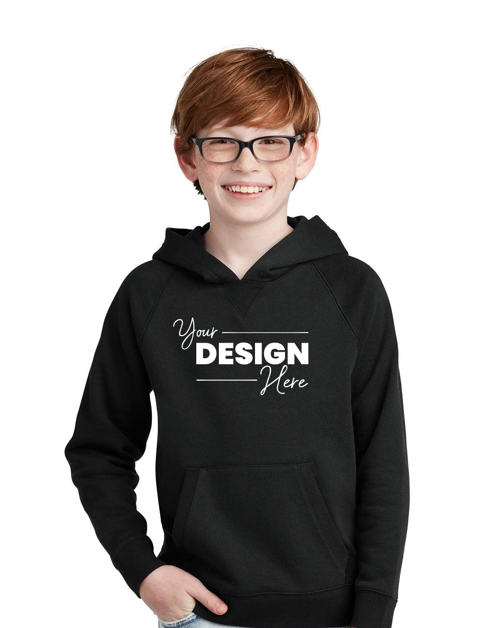A young person with glasses wears a Sport-Tek Youth Drive Fleece Pullover Hoodie, made of cotton-rich fleece, customizable with the text "Your Design Here," standing against a plain background.