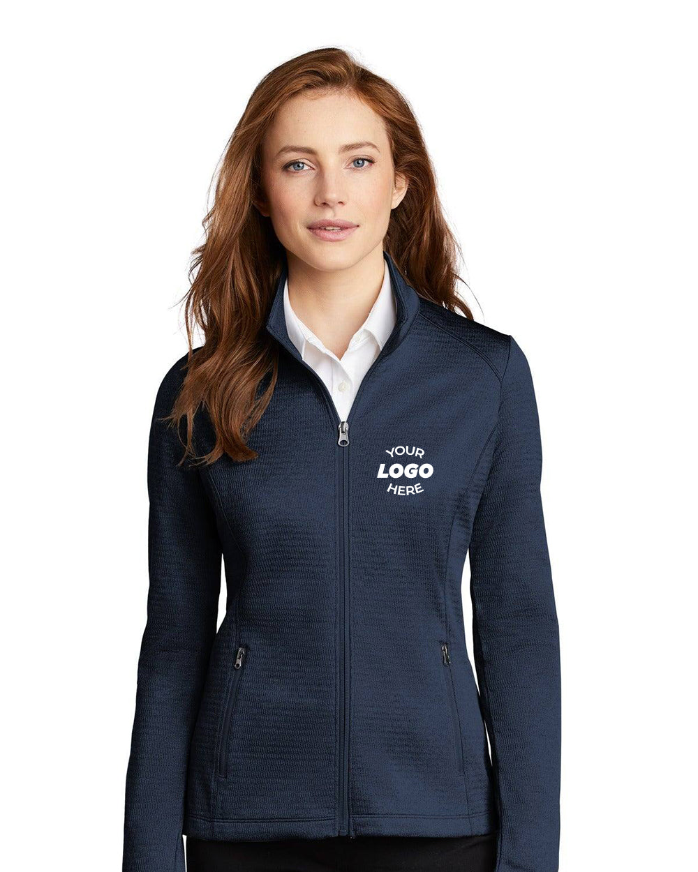 A person is standing against a plain white background wearing a navy Port Authority Ladies Diamond Heather Fleece Full-Zip Jacket L249 with "Your Logo Here" on the chest, highlighting its elegant design and customization options.