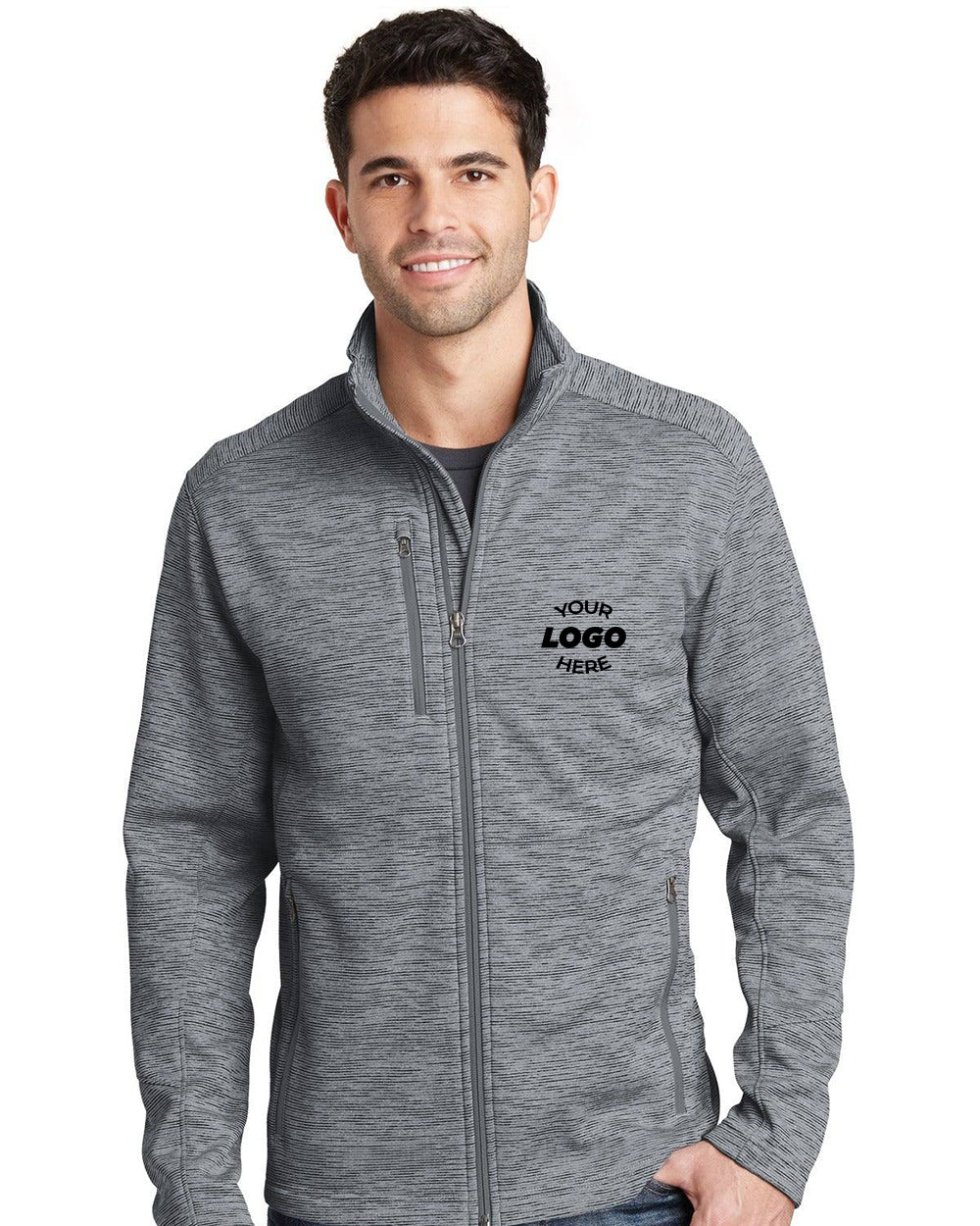 A man faces the camera, smiling in a Port Authority Digi Stripe Fleece Jacket F231 in light gray with a mock neck and custom logo printed on the left chest, highlighting the jacket’s great branding options.