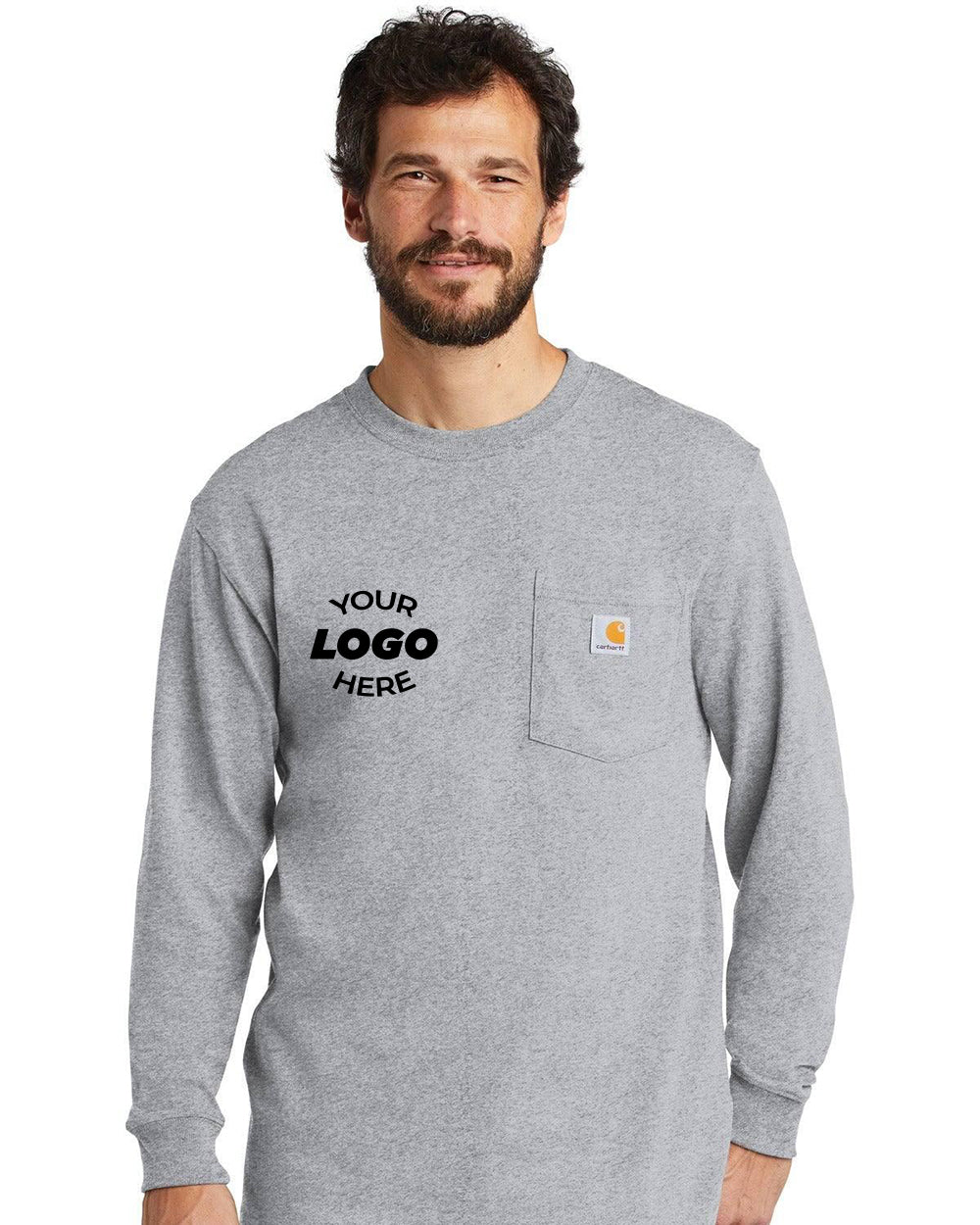 A bearded man wears a Carhartt Workwear Pocket Long Sleeve T-Shirt CTK126, capturing the essence of durable workwear.
