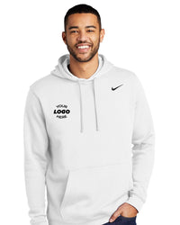 A man is wearing a white Nike Club Fleece Pullover Hoodie Sweatshirt (CJ1611) featuring an embroidered Swoosh on the left chest. He is smiling and has his left hand in his pocket.