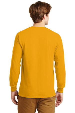 A person is seen from the back wearing brown pants and a Gildan 100% US Cotton long-sleeve yellow T-shirt (Pack of 36, style 2400) with a custom screen-printed logo included.