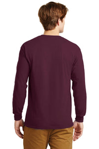 A person is seen from behind wearing tan pants and a maroon Gildan 100% US Cotton Long Sleeve T-Shirt (Pack of 36, style 2400) with a custom screen printed logo included.