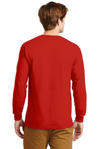A man is seen from behind in tan pants and a red Gildan 100% US cotton long sleeve T-shirt (Pack of 36, style 2400) with custom screen printed logo, set against a white background.