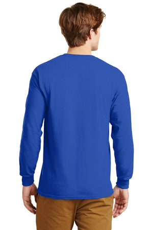A man wearing tan pants and a royal blue Gildan 2400 long sleeve T-shirt made from 100% US cotton, with a custom screen printed logo, is shown from the back against a white background. (Pack of 36).