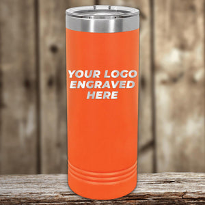 Custom Logo 22 oz Skinny Tumbler with "your logo engraved here" text, displayed on a wooden surface with a blurred background, ideal as a promotional gift from Kodiak Coolers.