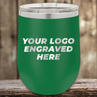 A green Kodiak Coolers tumbler with a clear lid and "YOUR LOGO ENGRAVED HERE" in white—custom logo front engraving included. Ideal for promotions or personalized gifts. $200 minimum order during the 4th of July SALE.
