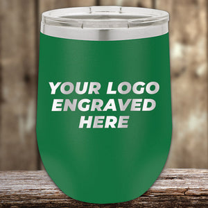 A green Kodiak Coolers tumbler with a clear lid and "YOUR LOGO ENGRAVED HERE" in white—custom logo front engraving included. Ideal for promotions or personalized gifts. $200 minimum order during the 4th of July SALE.