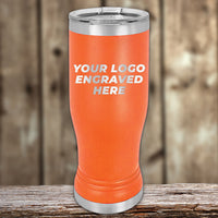 Customizable Kodiak Coolers Pilsner Tumblers 14 oz with your Logo or Design Engraved - Special Bulk Wholesale Pricing displayed on a wooden surface.