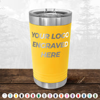 Custom Pint Tumblers 16 oz with Slider Lid by Kodiak Coolers with double-walled insulation and customizable engraving space displayed on a wooden surface.