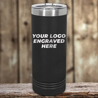 A black insulated Kodiak Coolers custom skinny tumbler with a customizable engraving area displayed on a wooden surface.