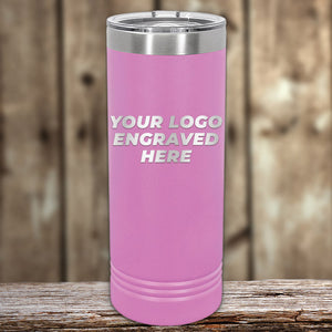 A pink stainless steel tumbler by Kodiak Coolers, shown upright with a clear lid and custom front-engraved logo, is ideal for unique promotional gifts—order the "Xmas in July SALE - Engraved Custom Logo Drinkware" (minimum order $200).