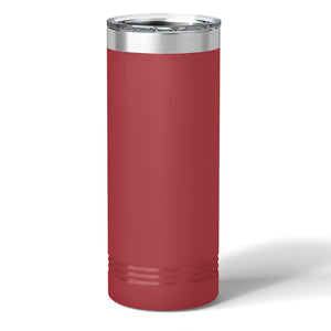 A tall, cylindrical red 22 oz custom skinny tumbler from Kodiak Coolers with a clear lid and metallic rim stands against a plain white background, featuring an elegantly laser-engraved logo.