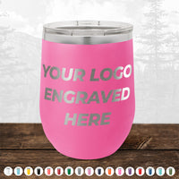 A pink insulated tumbler from Kodiak Coolers on a wooden table featuring the text "Custom Drinkware Engraved with your Logo or Design - Front Side Logo Included," with various color options displayed underneath, is perfect as a promotional gift. Don't miss the HUGE LABOR DAY SALE - ENDS TODAY!