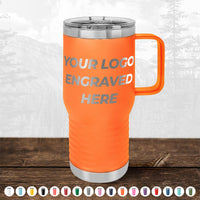 An orange insulated travel mug with a handle and clear lid from Kodiak Coolers is displayed on a wooden surface. The text "YOUR LOGO ENGRAVED HERE" is printed on the mug, making it an ideal promotional gift. Various color options are shown beneath it, perfect for custom drinkware to suit any brand style. Get yours today in our HUGE LABOR DAY SALE - ENDS TODAY!