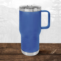 A 20 oz Wisconsin Green Bay Bulldogs travel mug by Kodiak Coolers with school-themed laser engraving and clear lid sits on wood, handle visible, faint mountain landscape in the background.