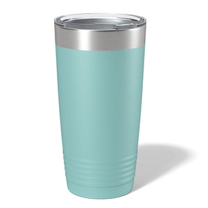 A Kodiak Coolers stainless steel tumbler with a customizable logo space, ideal as a promotional gift, displayed on a wooden surface with a blurred forest background.
