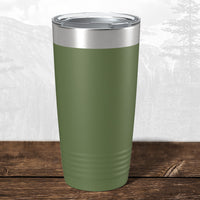 A Kodiak Coolers 20 oz stainless steel tumbler featuring a laser-engraved "Wisconsin Luxemburg Casco Spartans" design and clear lid rests on wood, perfect as a school drinkware gift or for your personalized mug collection.