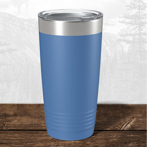 A Wisconsin Green Bay Bulldogs 20 oz tumbler by Kodiak Coolers with a laser-engraved design and clear plastic lid rests on a wooden surface—perfect for showing your school spirit.