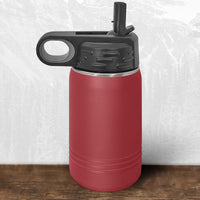 A Kodiak Coolers 12 oz water bottle with flip top straw features a laser-engraved Wisconsin Luxemburg Casco Spartans design—ideal school drinkware for fans.